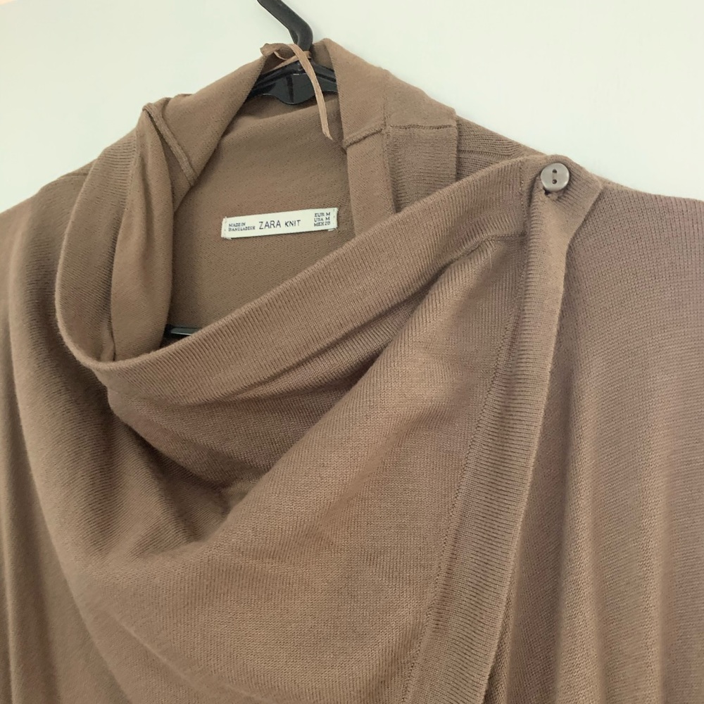 Brown single-button cardigan.